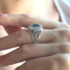 Filigree Art Blue Topaz Gemstone Women Oval Silver Cocktail Ring - Elegant and Timeless - Image 2